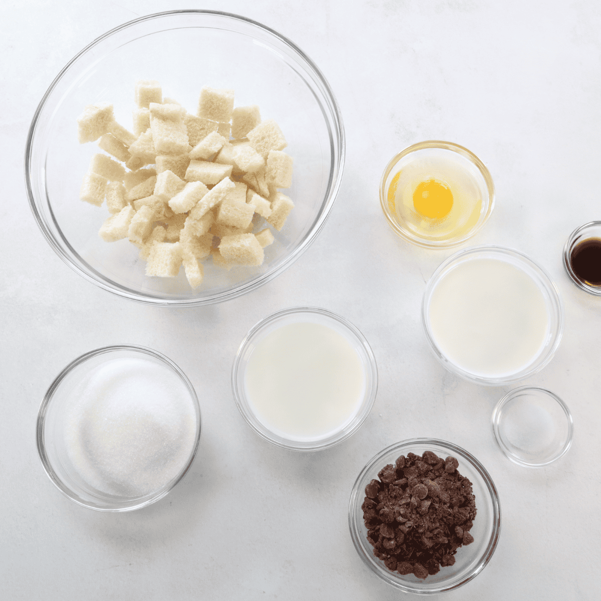 Ingredients needed for Golden Corral Bread Pudding on kitchen table.