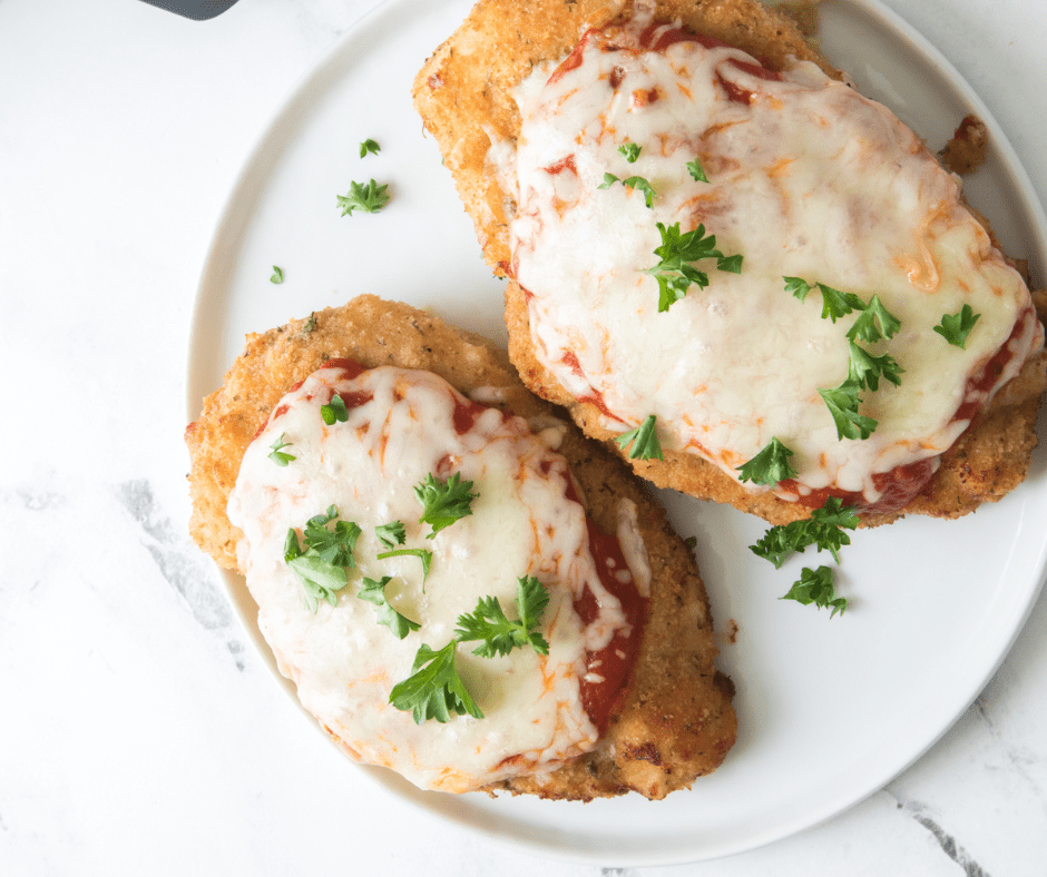 Looking for an easy and delicious weeknight meal? Try air fryer chicken Parmesan! This dish is simple to make and tastes great. Plus, it's a healthier option than traditional chicken Parmesan. Give it a try!



If you're looking for a delicious and easy chicken recipe, you've got to try this Air Fryer Chicken Parmesan. It's the perfect weeknight meal! The chicken is coated in crispy breadcrumbs and then baked in the air fryer until golden brown. Serve it with some marinara sauce and melted cheese for a tasty dinner that the whole family will love.