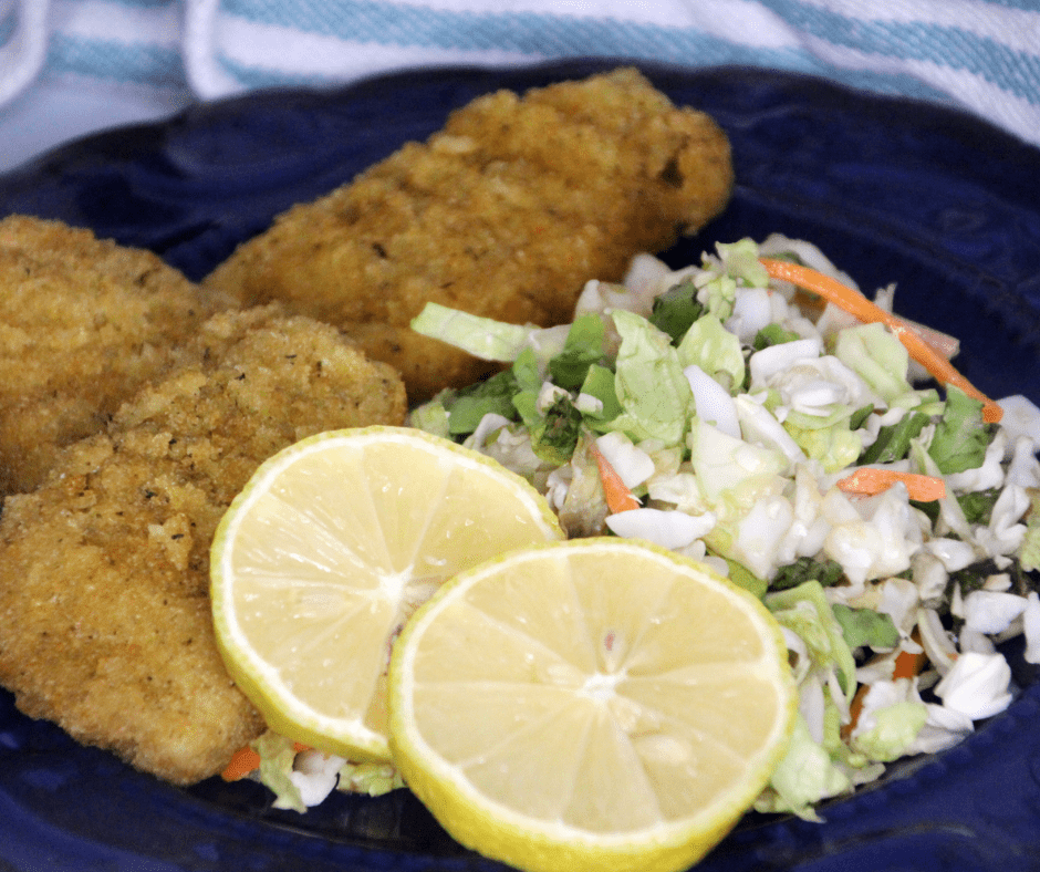 Gortons Fish Fillets In Air Fryer on plate with salad and lemon slices