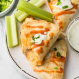 Blackstone Chicken Quesadilla filled with seasoned chicken and melted cheese on a flat-top griddle