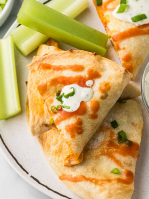 Blackstone Chicken Quesadilla filled with seasoned chicken and melted cheese on a flat-top griddle