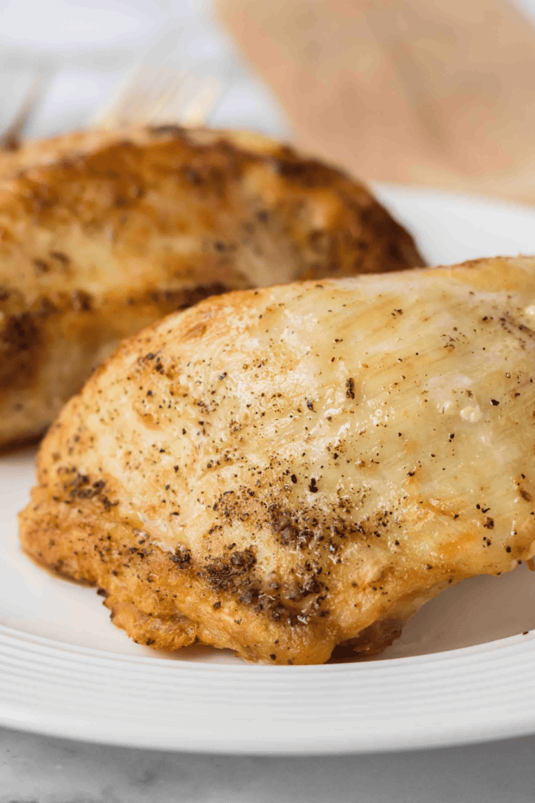 Tender, juicy Ninja Foodi frozen chicken breast cooked to perfection.