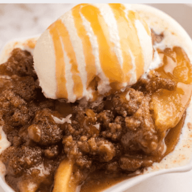 Close-up of Logan’s Roadhouse Cinnamon Apples served in a bowl, featuring tender apple slices coated in a glossy cinnamon glaze.