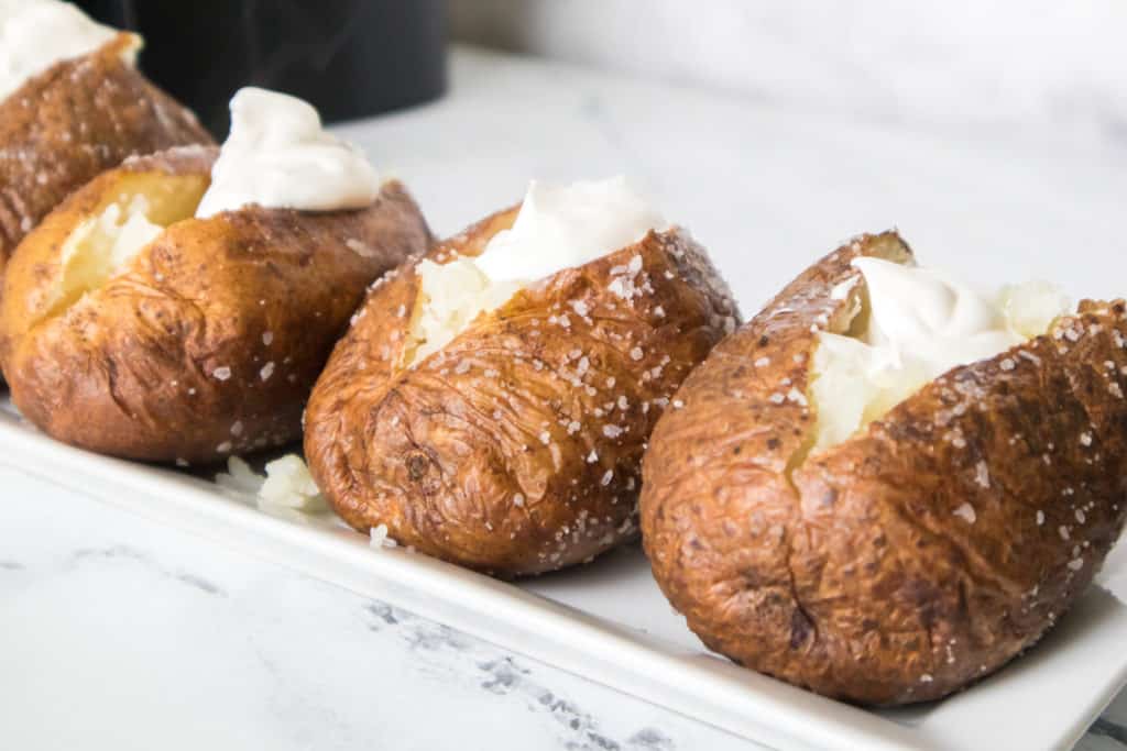 Crispy Air Fryer Steakhouse Potatoes served on a white plate.