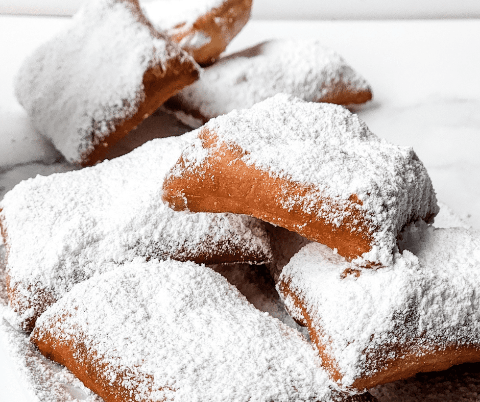 Air Fryer Beignets With Powdered Sugar on Plate