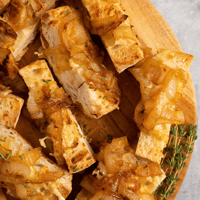 Air Fryer French Onion Cheese Bread with caramelized onions and melted Gruyere cheese on a crispy golden crust