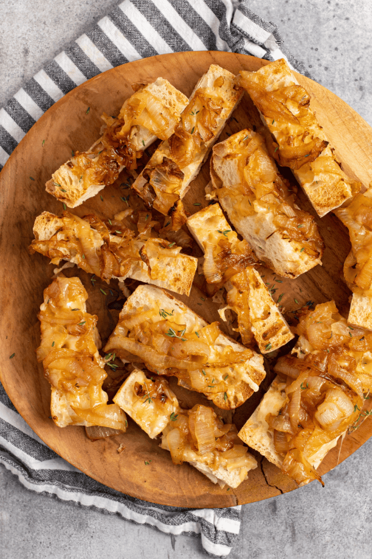 Air Fryer French Onion Cheese Bread with caramelized onions and melted Gruyere cheese on a crispy golden crust