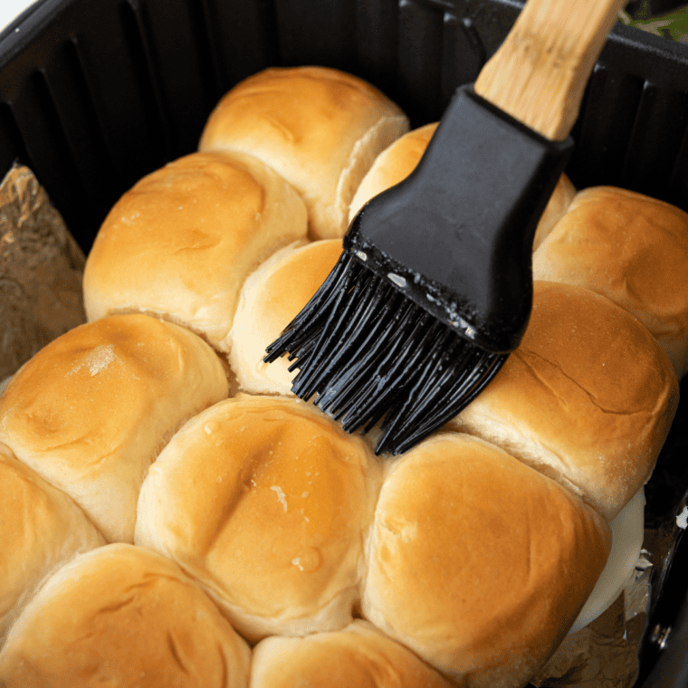 Air Fryer Italian Beef Sliders with shredded beef, melted mozzarella, and toasted rolls.