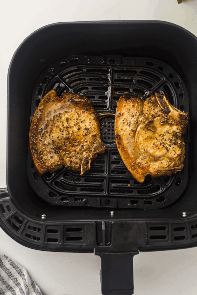 Crispy, juicy Air Fryer Ranch Pork Chops, seasoned with ranch dressing mix, perfect for a simple and delicious dinner.