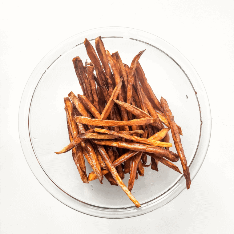 Mix the potato fries with the olive oil and seasonings.