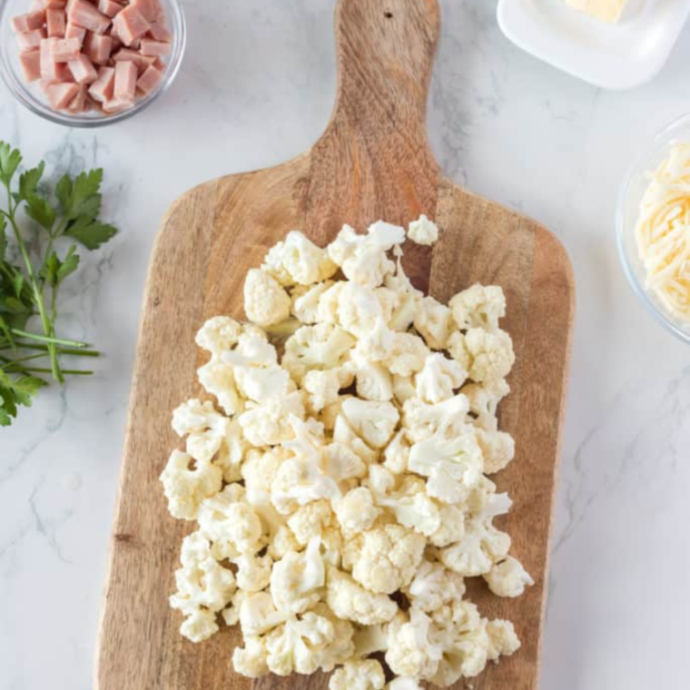 "Step-by-step process of preparing cauliflower cheese in the air fryer."