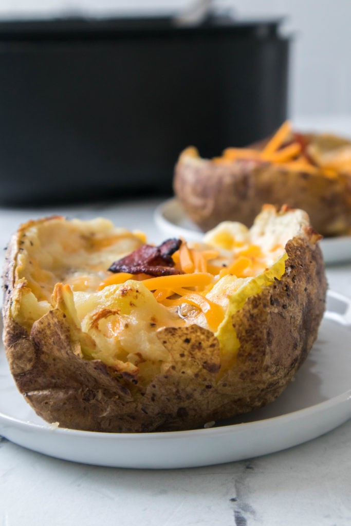 Twice Baked Potato on a white plate