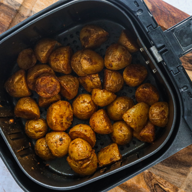 Golden Air Fryer Bombay Potatoes seasoned with Indian spices and roasted to crispy perfection