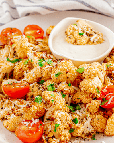 Air-Fryer-Cauliflower-and-Tomatoesgetables for extra variety? Whatever you choose to do, our air fryer cauliflower with tomatoes dish is sure to be a hit!