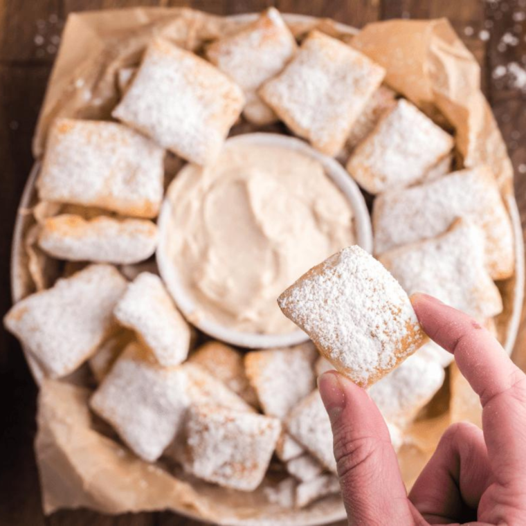 Air Fryer Domino's Cinnastix on a plate, showcasing their crispy texture and sweet cinnamon topping.