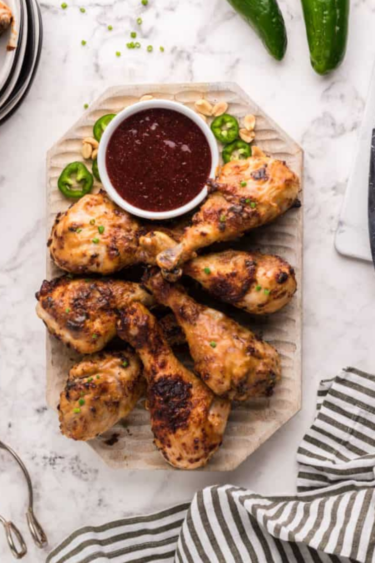 Close-up of crispy air fryer honey mustard chicken legs.