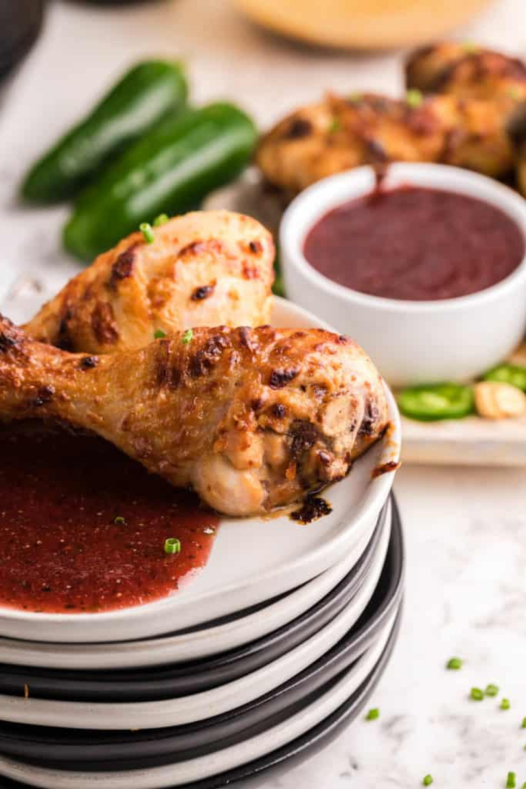 Close-up of crispy air fryer honey mustard chicken legs.