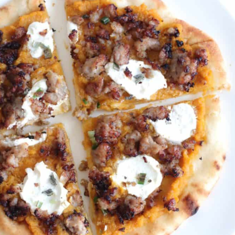 Air Fryer Savory Pumpkin Ricotta Pizza topped with ricotta, pumpkin, chives, sage, and sausage, cooked to perfection in the air fryer.