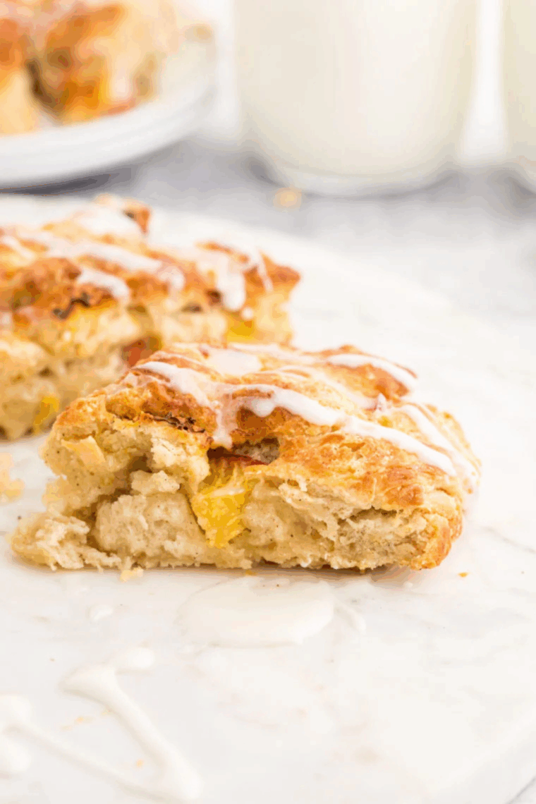 Finished golden brown air fryer peach scones ready to serve.