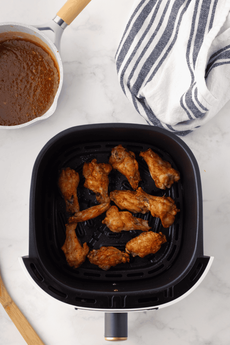Cooked Gluten-Free Chicken Wings Recipe in the air fryer basket.