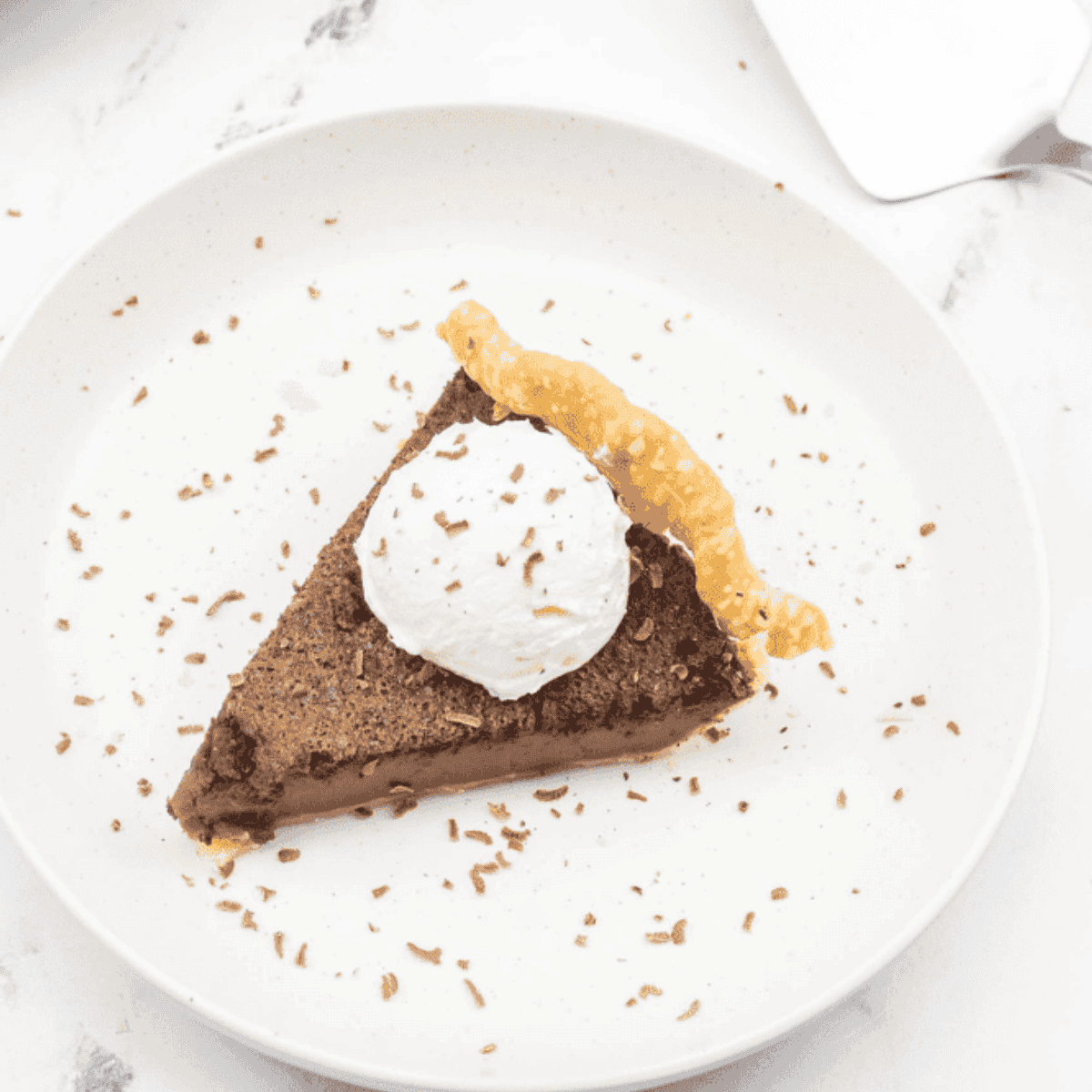 Golden Corral-style chocolate chess pie with smooth fudgy filling and a golden flaky crust.