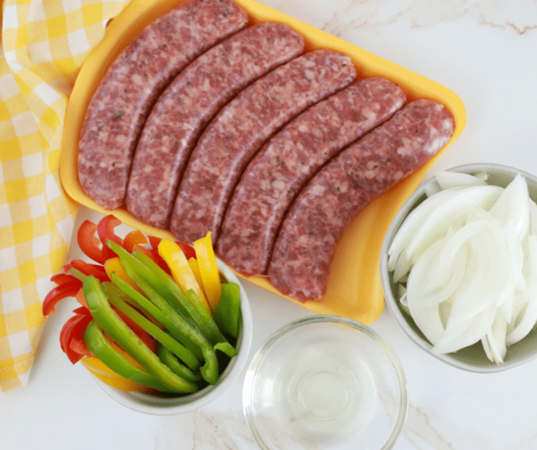 overhead bratwurst and peppers ingredients