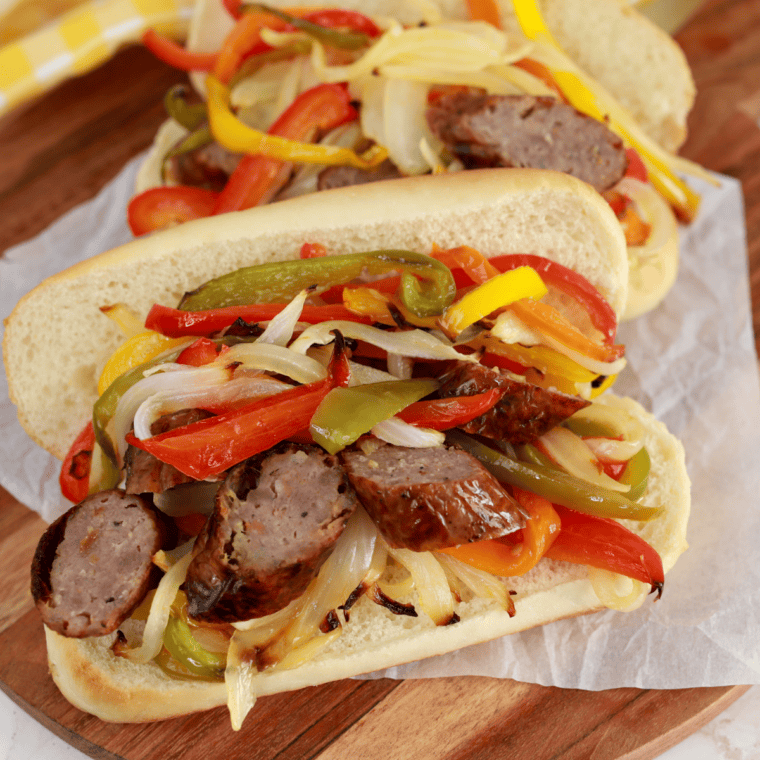Sliced air fryer brats with peppers and onions
