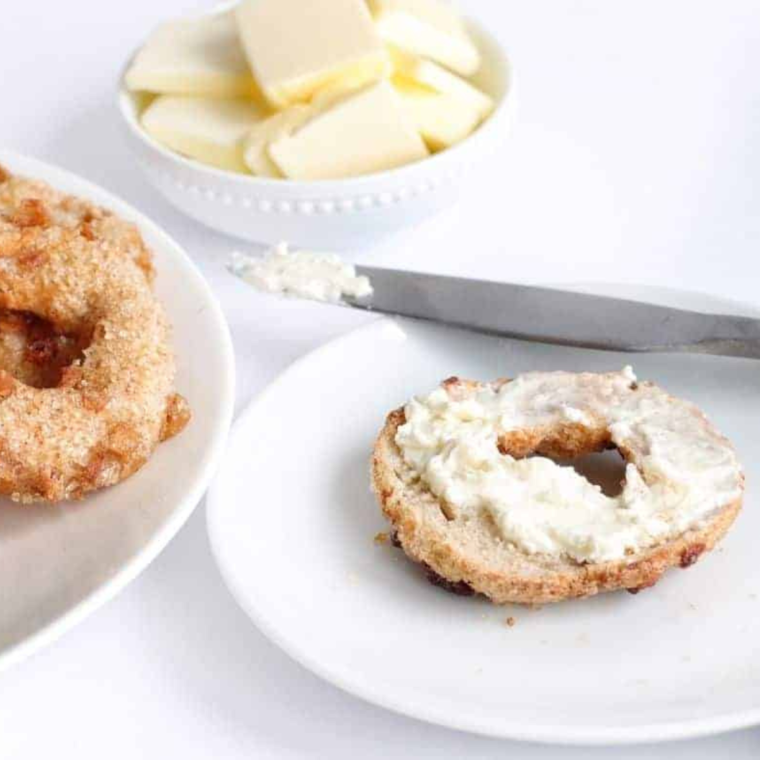 Air Fryer Apple Cinnamon Bagels with a golden-brown crust and chunks of sweet apple