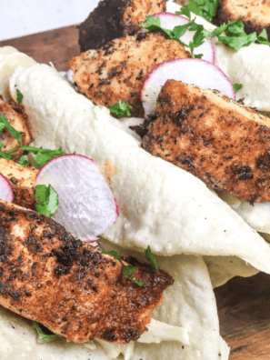 Golden, blackened cod fillets in the air fryer, crispy on the outside and flaky on the inside.