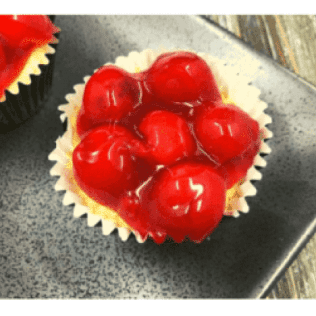 This is one of my favorite recipes, and with the holidays coming up, I really wanted to make another batch of Air Fryer Cherry Cheesecake Cupcakes.