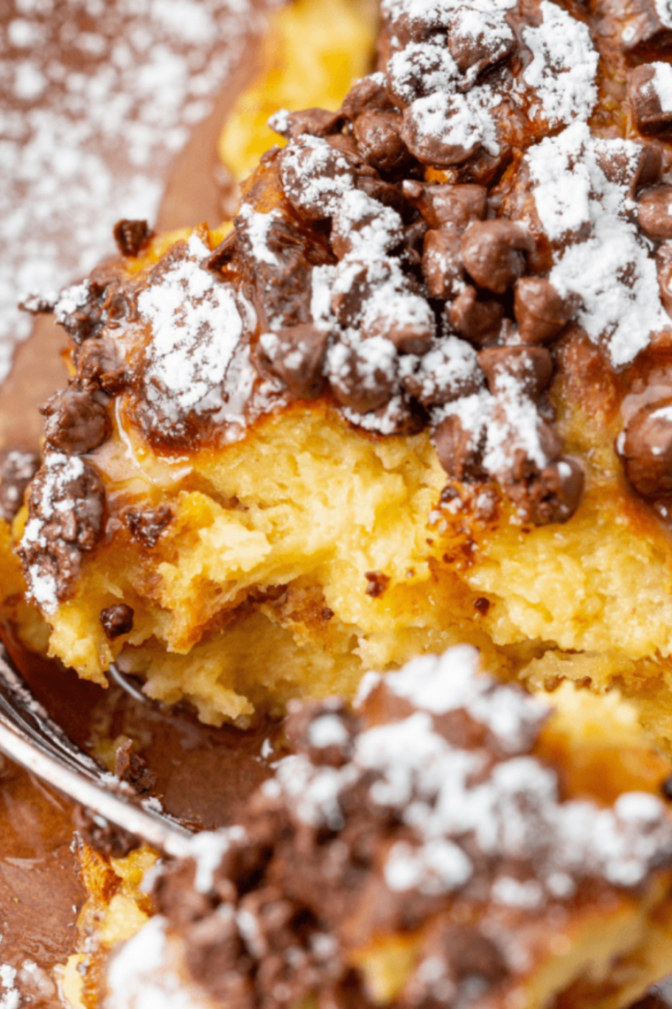 Air fryer chocolate chip French toast casserole with golden baked bread and melted chocolate chips on top