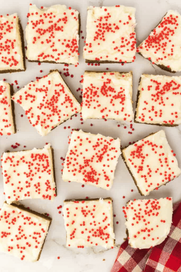 Golden-brown Air Fryer Gingerbread Cookie Bars cut into squares, showing soft, spiced texture.