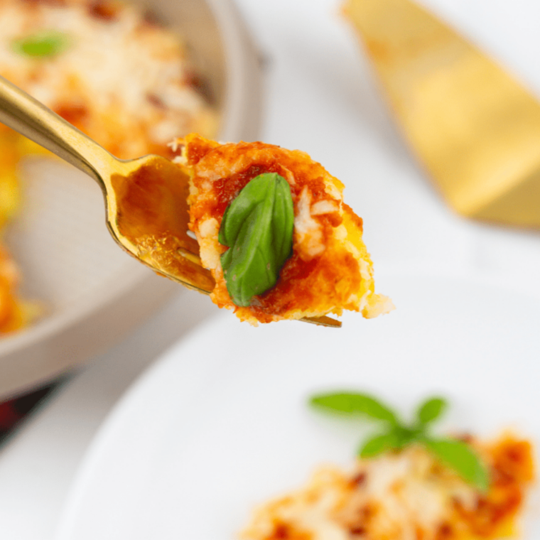 Air fryer keto egg lasagna with layers of eggs, melted cheese, and savory fillings