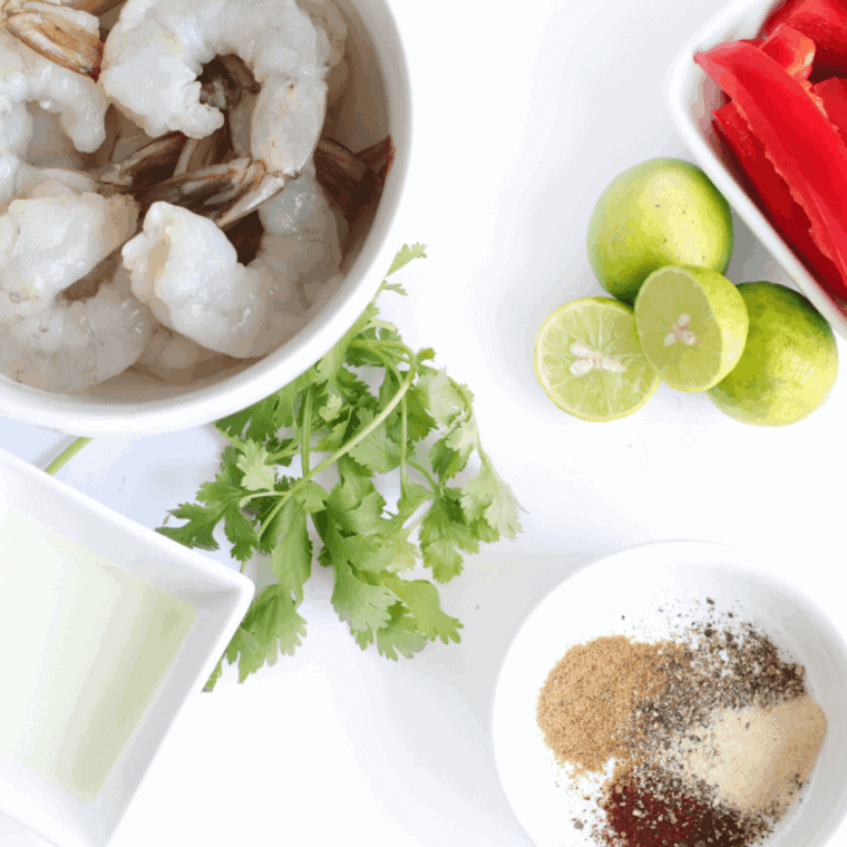Ingredients needed for Air Fryer Shrimp Fajita Bowls on kitchen table.