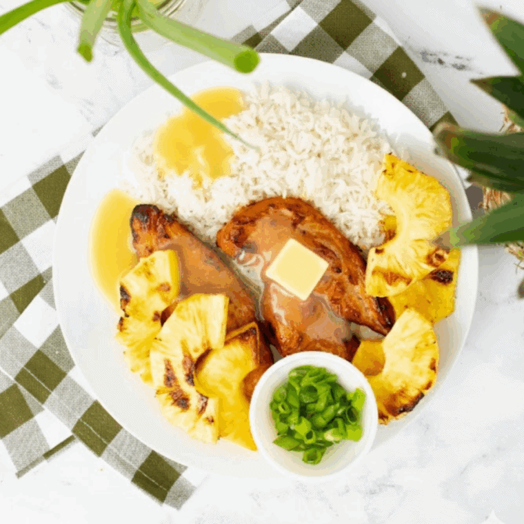 Juicy Air Fryer Aloha Grilled Chicken skewers with pineapple and cilantro, golden brown and ready to serve.