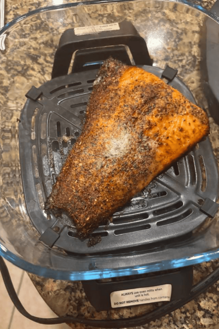 crispy golden salmon fillet cooked in Ninja CRISPI, served on plate