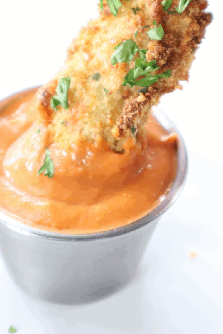 Golden, crispy air fryer eggplant fries in a basket, ready to serve