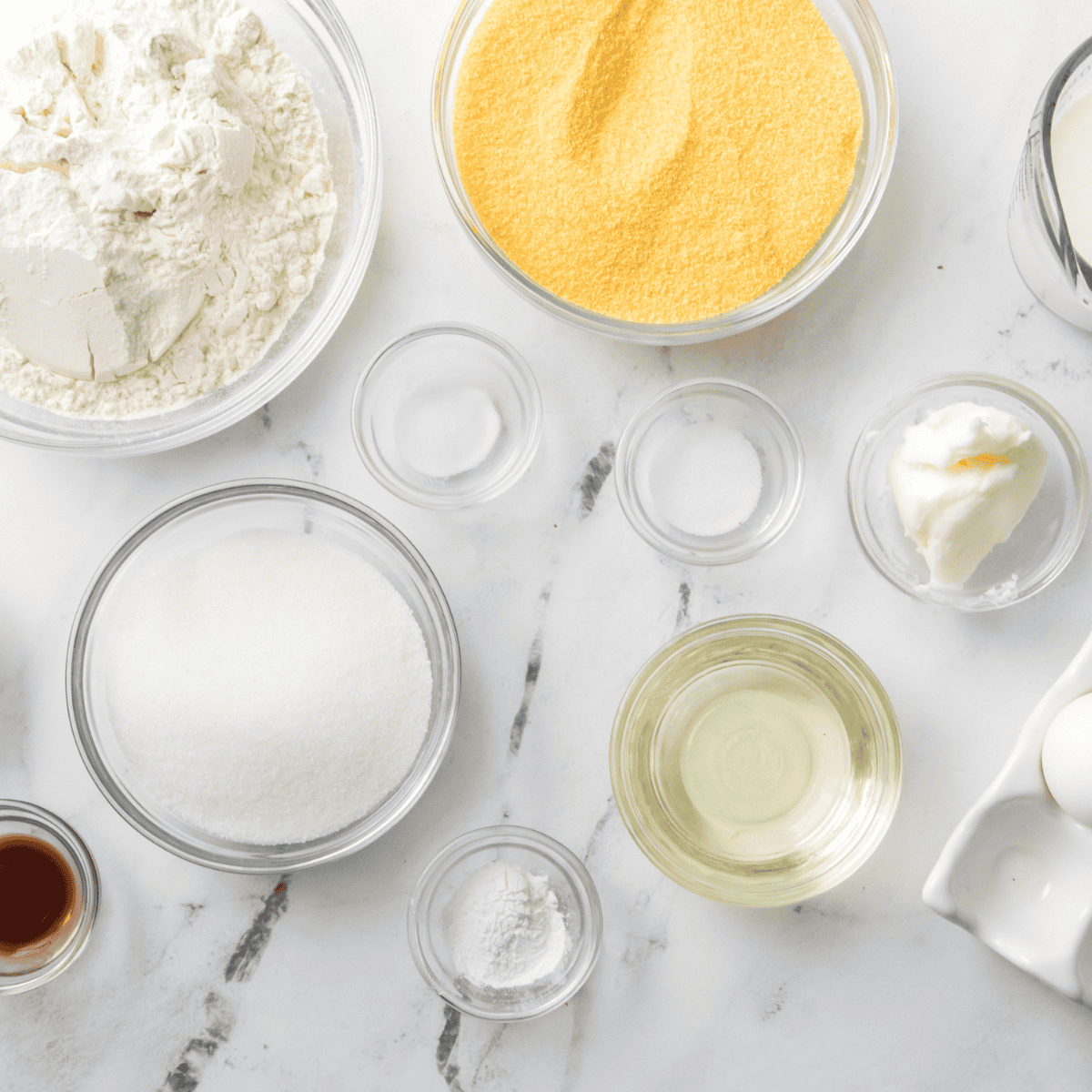 Ingredients needed for Golden Corral Cornbread Recipe on kitchen table.