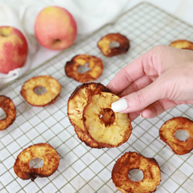 Make crunchy apple chips at home using your air fryer. This quick dehydration method delivers sweet, cinnamon-spiced snacks in minutes.