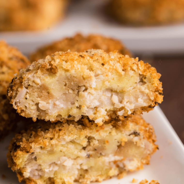 "Golden and crispy Air Fryer Chicken Croquettes served with a side of dipping sauce."