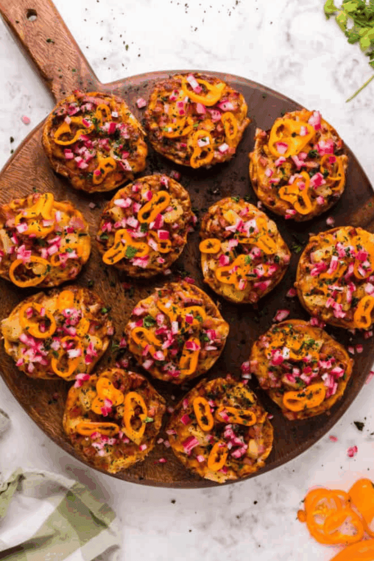 Air fryer gluten free pizza bagels with melted cheese and assorted toppings, cooked to golden perfection.