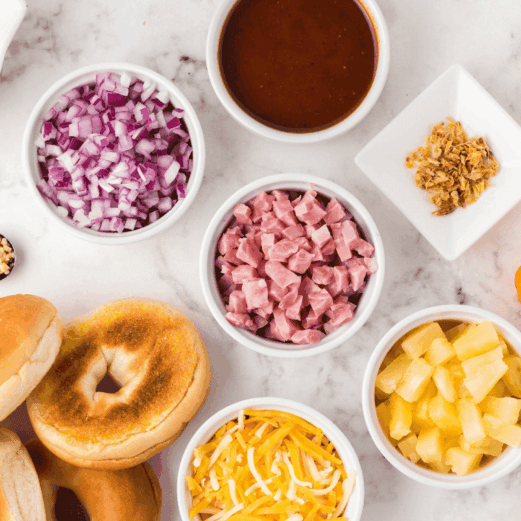 Ingredients needed for Air Fryer Gluten Free Pizza Bagels on kitchen table.