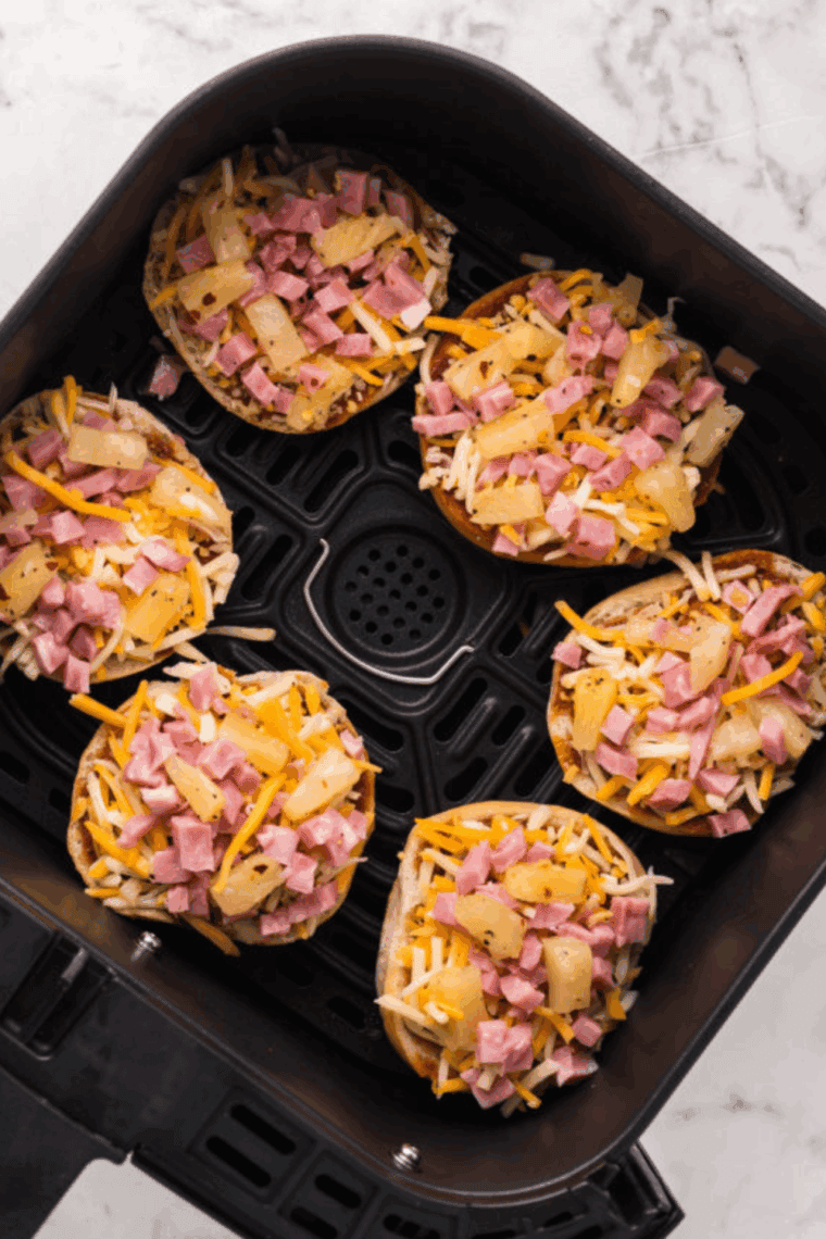 Place Gluten Free Pizza Bagels in the air fryer basket.