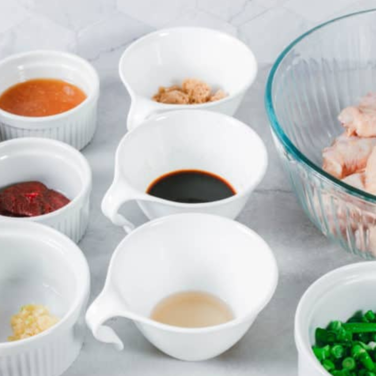 Ingredients needed for Air Fryer Korean Chicken Wings on kitchen table.