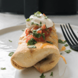 Golden, crispy Air Fryer Shrimp Chimichangas filled with seasoned shrimp and ready to serve with your favorite dipping sauce.