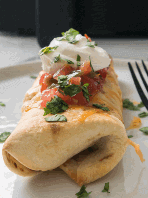 Golden, crispy Air Fryer Shrimp Chimichangas filled with seasoned shrimp and ready to serve with your favorite dipping sauce.