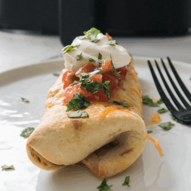 Golden, crispy Air Fryer Shrimp Chimichangas filled with seasoned shrimp and ready to serve with your favorite dipping sauce.