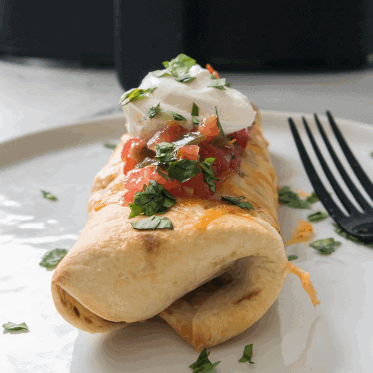 Golden, crispy Air Fryer Shrimp Chimichangas filled with seasoned shrimp and ready to serve with your favorite dipping sauce.