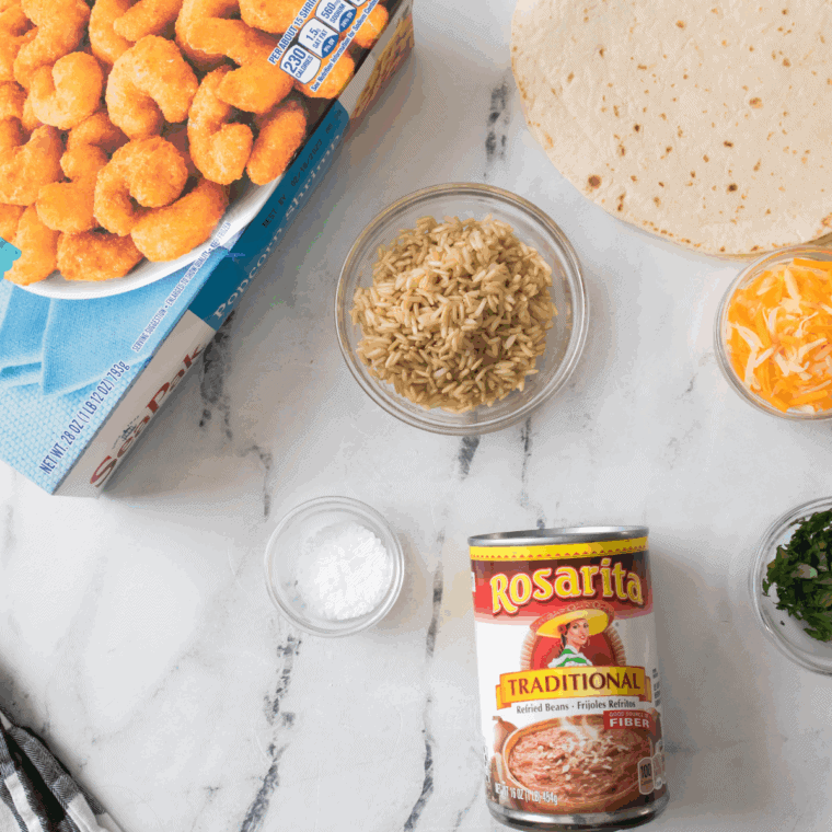 Ingredients needed for air fryer shrimp chimichangas on kitchen table.