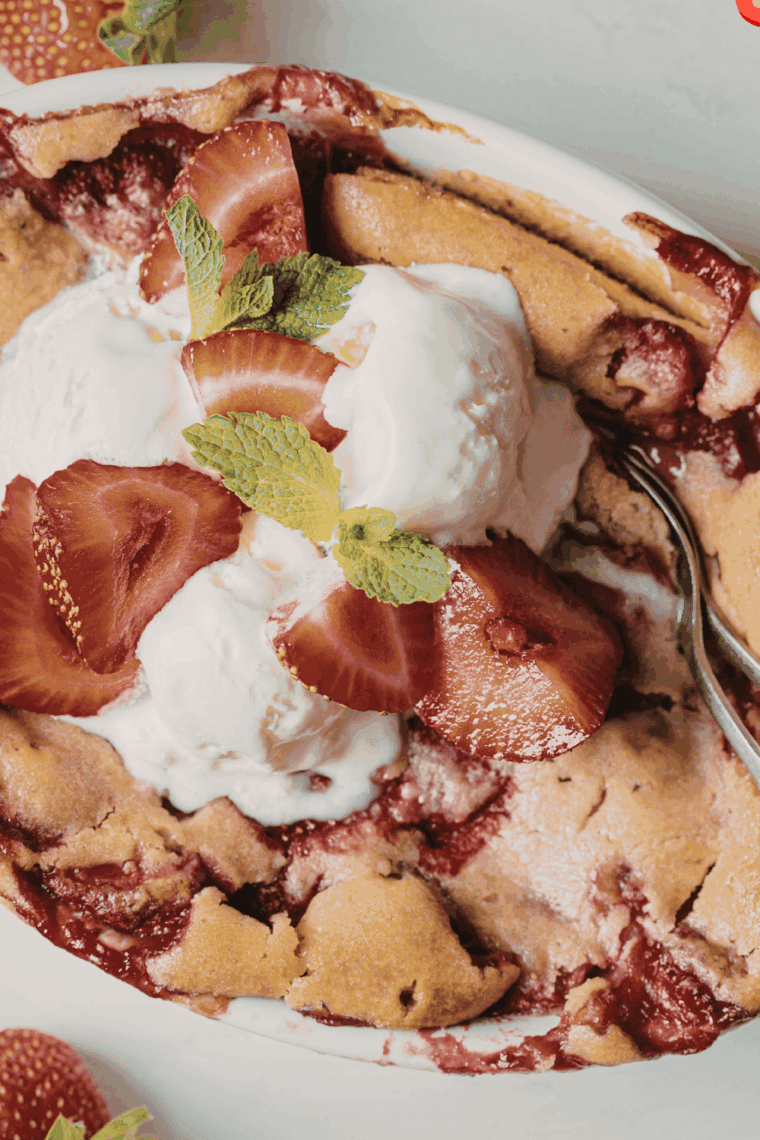Air Fryer Strawberry Cobbler with sweet strawberries and golden, crumbly topping served in a bowl.